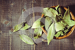 Spices of bay leaf in rural style/bay leaf on a wooden surface.