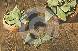 Spices of bay leaf in rural style on a wooden table/bay leaf in