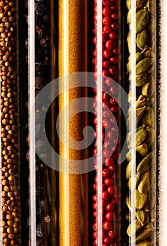Spices in beakers close-up