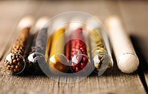 Spices in beakers close-up