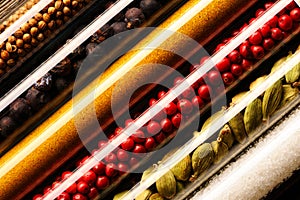 Spices in beakers close-up