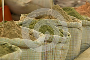 Spices being sold from sacks in a market in Thimphu, the capital of Bhutan