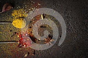 Spices food background. selection variety dry Whole and ground spices on a black background