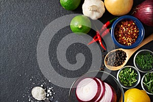 Spices and Food Ingredients on Slate Background