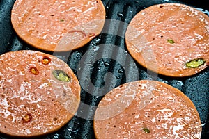 Spices Ham frying in pan