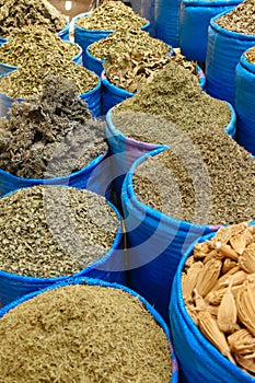 Spices and herbs being sold at a Moroccan market in Marrakesh, Morocco.