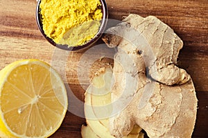 Spices and herbs in ceramic bowls. curcuma and ginger seasoning.