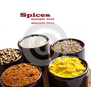 Spices and herbs in ceramic bowls. seasoning. Colorful natural a