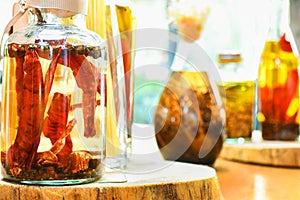 Spices and herbs ingredients in decorative glass bottles,kitchen decoration