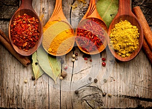 Spices and herbs over wood