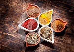 Spices, herbs and spicy in bowls