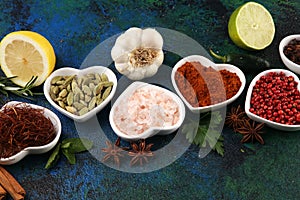 Spices and herbs on table. Food and cuisine ingredients with oil and vinegar