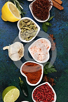 Spices and herbs on table. Food and cuisine ingredients with oil and vinegar