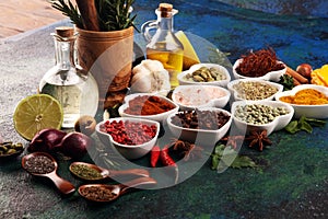 Spices and herbs on table. Food and cuisine ingredients with oil and vinegar