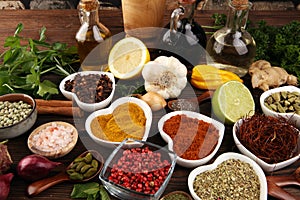 Spices and herbs on table. Food and cuisine ingredients with oil and vinegar