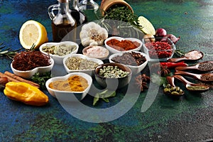 Spices and herbs on table. Food and cuisine ingredients with oil and vinegar