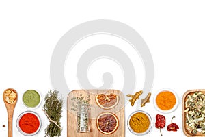 Spices and herbs on white background. top view