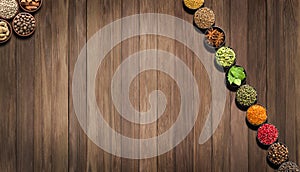 Spices and herbs on wooden table. seasoning for food, top view.