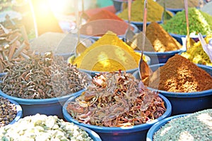 Spices India. Spices are sold on the market in India. Red pepper, cinnamon, baden, turmeric, anise, cardamom and others