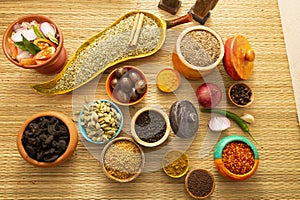 spices ingredients creative concept black pepper cardamom nutmeg mustard seeds spicy curry powder