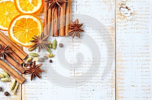 Spices for mulled wine on a white wooden background. Christmas, New Year background.
