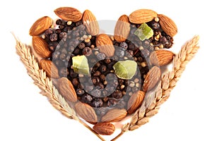 Spices and nuts in heart shape