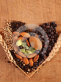 Spices and nuts in heart shape