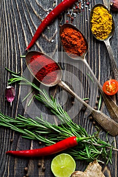 Spices over wooden background