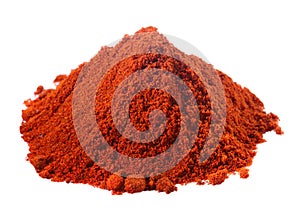 Spices - pile of red paprika over white