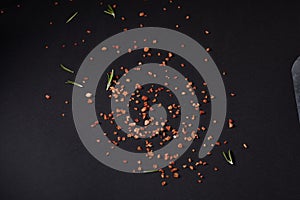 Spices scattered on a black background