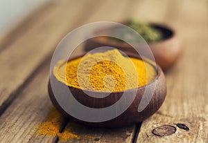 Spices in wooden bowls