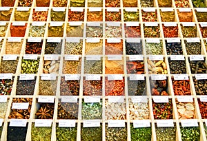 Spices in wooden boxe photo