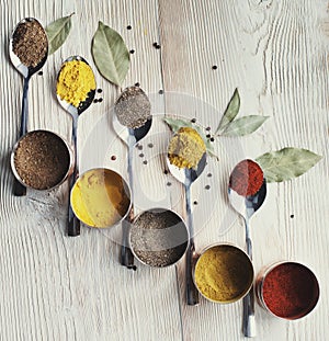 Spices on a wooden light background photo