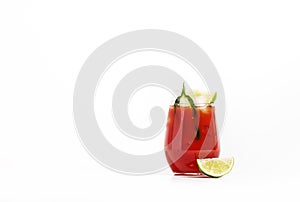 Spicy alcoholic cocktail with vodka, tomato juice, jalapeno pepper, lime and salt, white background, hard light, copy space