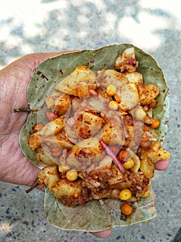 Spicy baked potato pea gram onion readymade street food. photo