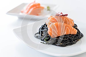 spicy black spaghetti with salmon