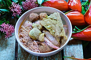 Spicy brewed bean curd noodle or yong tau foo or Yentafo Tomyam