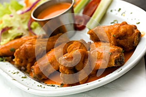 Spicy Buffalo Wings with Blue Cheese Dip Celery an