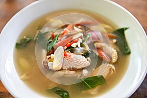 Spicy Chicken Soup - Chicken Tom Yum Spicy Thai food on white bowl