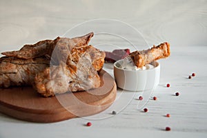 Chiken wings with sour creme photo