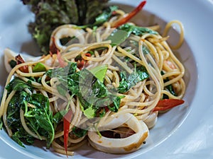 Spicy chili basil spaghtti with squid