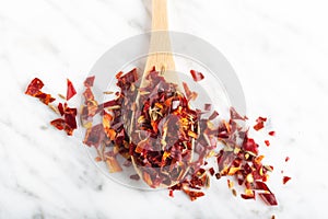 Spicy cutted Chili peper mix on stone background