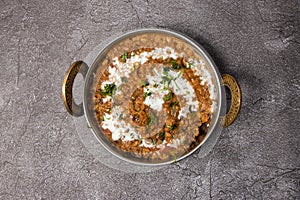 Spicy dal makhni or daal butter lentil served in karahi isolated on background top view of bangladesh food