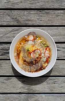 Spicy egg noodle soup with roasted pork