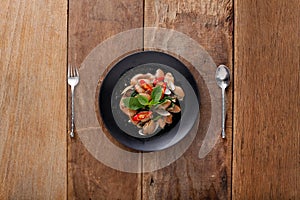 Spicy fried Clams with herb,Ready to eat. On The Table