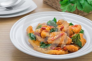 Spicy fried fish with basil (Pad kra prao pla), Thai food photo