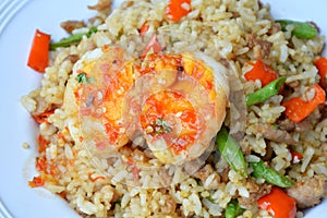 Spicy fried rice with minced pork and basil leaf topping sweet egg