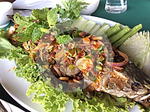 Spicy fried snake head fish