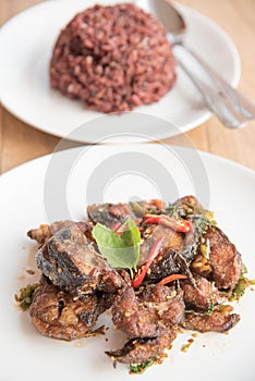 Spicy Fried Stir Catfish with basil and riceberry rice