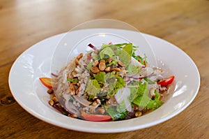 Spicy Glass Noodle Salad,mixed herbs with minced pork in chili sauce. Thailand spicy food menu